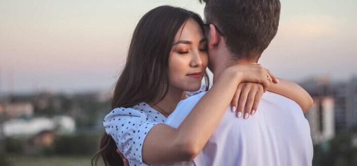 A couple hugging each other