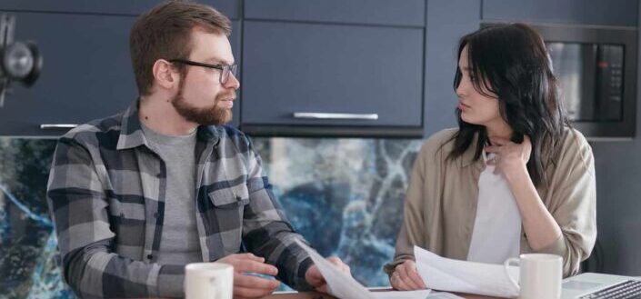 A couple taking about their finance