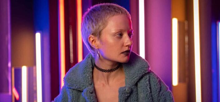 Short haired woman in a fleece jacket