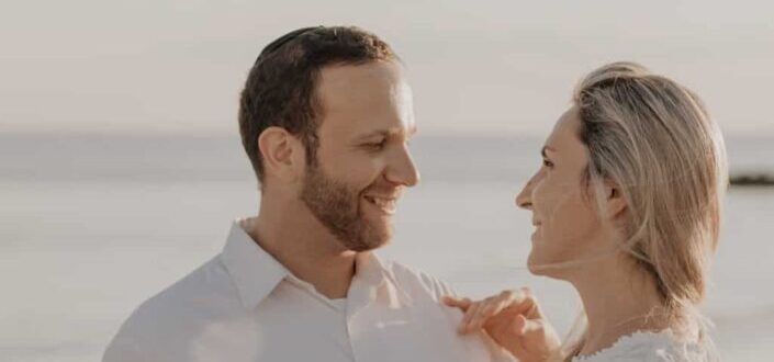sweet couple standing face to face