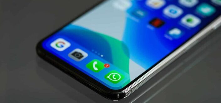 Smartphone lying on metal table