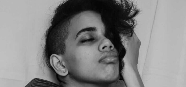 Woman eyes closed posing