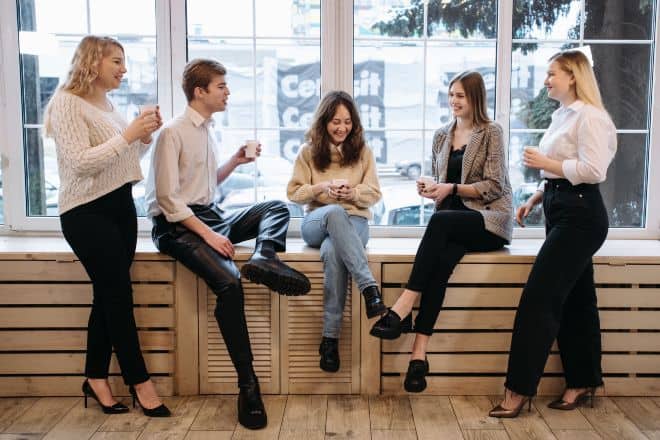 colleagues talking to each other - How To Be Less Awkward