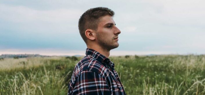 Man standing on grass field