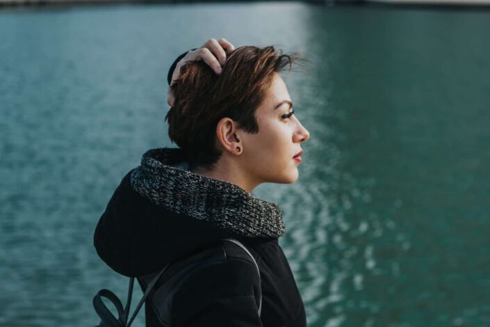 Woman wearing a black hoody jacket