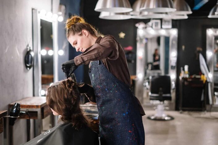 Woman getting a haircut
