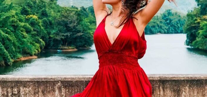 woman in red sleeveless dress