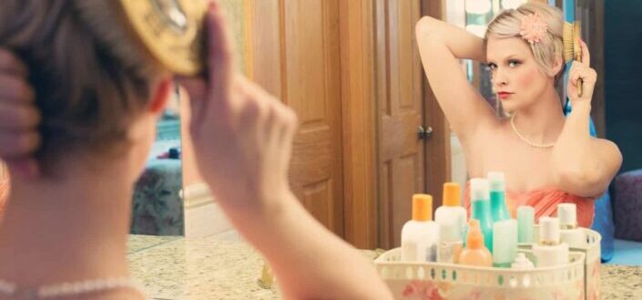 Woman using comb