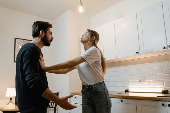A man and woman arguing
