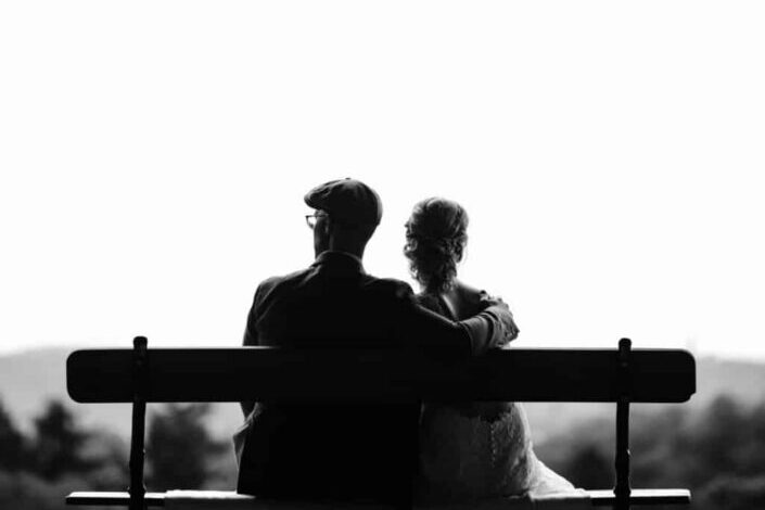 couple sitting on bench