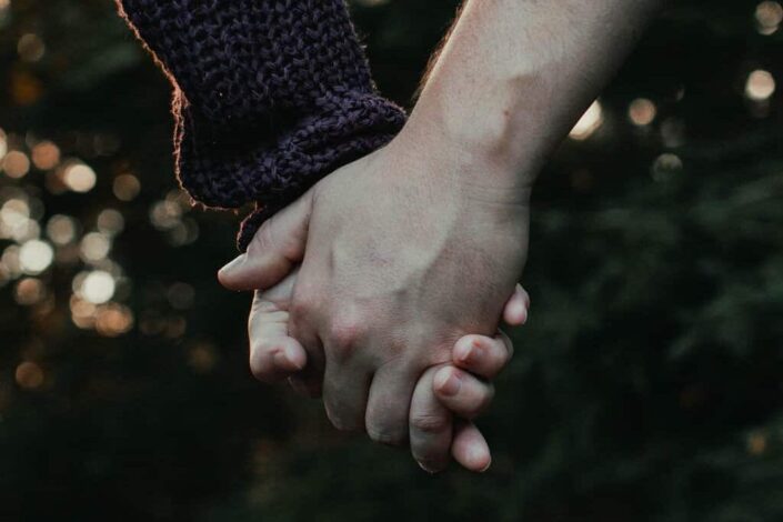 couple holding hands